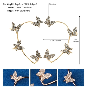Detail view of gold butterfly ear cuff showing 3.7cm width and 6cm height with rhinestones