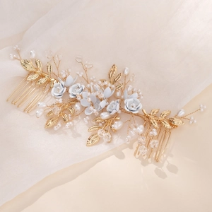 Elegant bridal hair comb with handmade white flowers, pearls and golden leaves