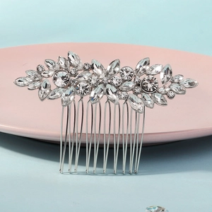 Elegant silver bridal hair comb with leaf shaped crystals and rhinestones for wedding