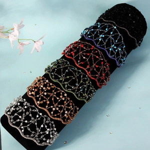 Detail of colorful crystal beaded mesh headbands in six elegant finishes for weddings