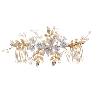 Elegant gold bridal hair comb with handmade flowers, leaves, and pearls for weddings