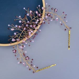 Vintage bridal hair accessory with purple crystals and gold floral beads for wedding hairstyles