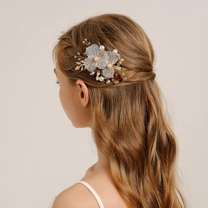 Handmade bridal hair clip with white mesh flowers, pearls, and gold leaf branch details