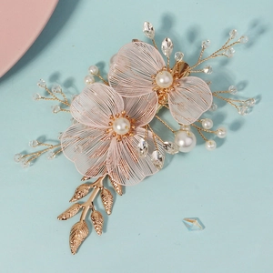 Exquisite bridal hair clip with pink mesh flowers, pearls and crystals for wedding styling
