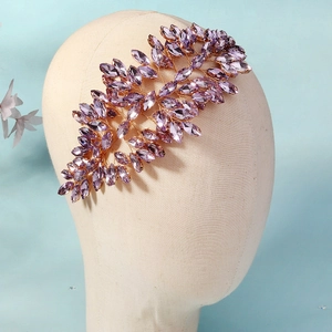 Detail of purple crystal leaf bridal headband with gold wire and rhinestones