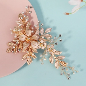 Luxurious gold metal flower hair clip with pearls and rhinestones for bridal weddings
