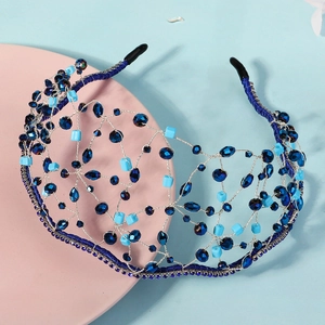 Detail of blue velvet headband with silver mesh, crystal beads and rhinestones