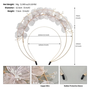 Detail view of handmade gold floral headband with white pearls and 54g weight dimension