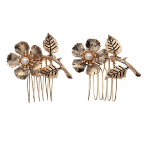 Vintage gold metal flower hair combs with white pearls for elegant bridal wedding hair styling