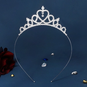 Silver crown headband with crystal heart pendant and rhinestones for bridal photography