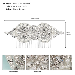 Detailed size view of bridal hair comb with rhinestones and white pearls in silver