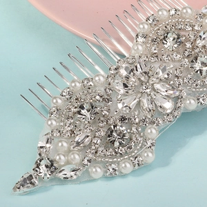 Elegant bridal hair comb with rhinestones, pearls and lace mesh for wedding hair styling