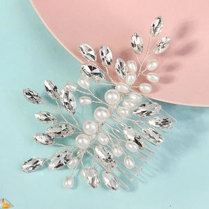 Silver bridal hair comb with marquise rhinestones and pearls on a bi-color background