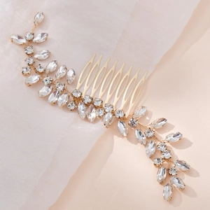 Exquisite gold bridal hair comb with shimmering leaf-shaped rhinestones for weddings
