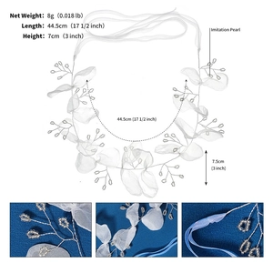 Detailed view of handmade bridal headband with mesh flowers and imitation pearls
