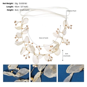 Detailed view of handmade bridal headband with ivory tulle leaves and artificial pearls