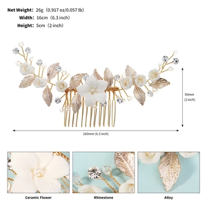 Detail view of handmade bridal hair comb with ceramic flowers and rhinestones 16x5cm