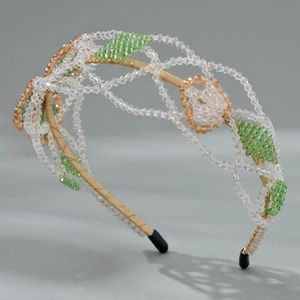 Elegant crystal bead headband with green and orange floral mesh on gold band