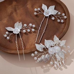 Silver bridal hair accessory set with leaf design, metal flowers and pearls