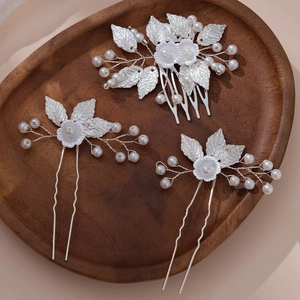 Elegant bridal floral hair comb and pins set with silver leaves and white faux pearls