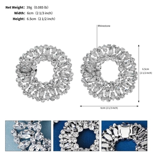 Macro detail showing 6.5cm silver rhinestone shoe clips with secure clip closure
