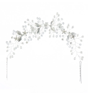 Exquisite bridal headband with crystals pearls and silver floral leaf details on white background