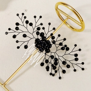 Handcrafted black beaded bridal hair comb with a tree branch design for elegant parties