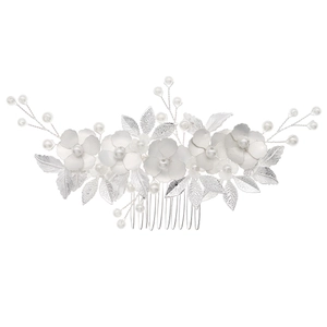Silver bridal hair comb featuring white painted metal flowers and elegant faux pearls