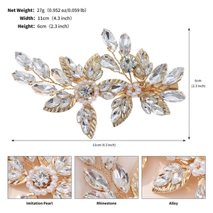 Close-up of bridal hair clip with gold alloy leaves, rhinestones and imitation pearls