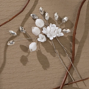 Épingle à cheveux élégante en céramique blanche avec cristaux et base argentée en forme de U