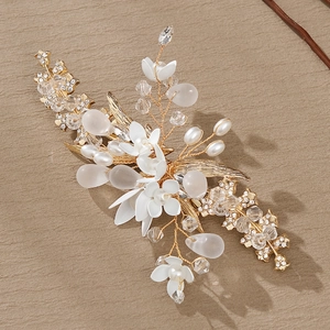 Handmade bridal hair clip with gold leaves, white flowers and pearls for wedding party