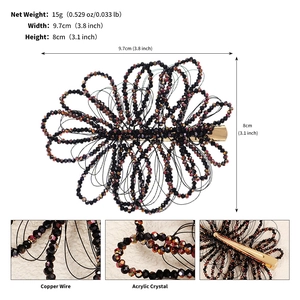 Detailed view of handmade black beaded hair clip with 9.7x8cm dimensions and weight
