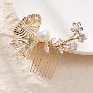 Luxurious gold wedding hair comb with ginkgo leaf, white pearls and sparkling crystals
