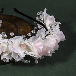 Elegant floral headband with pink silk flowers and crystal beads for wedding parties