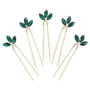 Five-piece set of gold bridal hair pins featuring radiant green marquise crystals