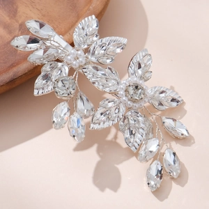 Exquisite silver floral bridal hair clip with sparkling crystals and white pearls