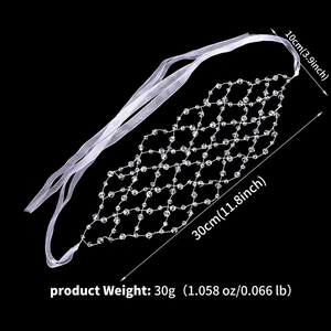Detail showing crystal mesh bridal headpiece measurements of 30cm length and 10cm width