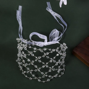 Detailed view of handmade crystal mesh headband with white ribbons and silver wire weaving