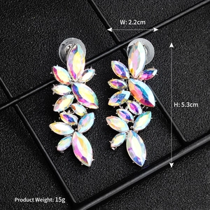 Macro view of bridal butterfly drop earrings with colorful AB crystals and alloy base