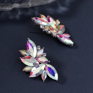 Close-up of AB crystal marquise-cut stones on silver butterfly bridal earrings