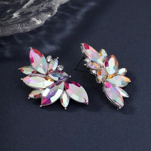 Detailed macro view of vibrant AB crystal butterfly earrings with marquise cut stones