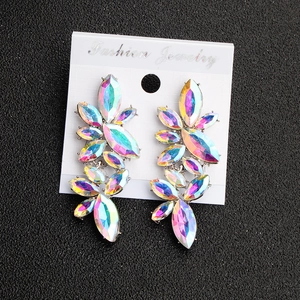 Detailed macro view of AB rhinestone marquise-cut crystal butterfly drop earrings