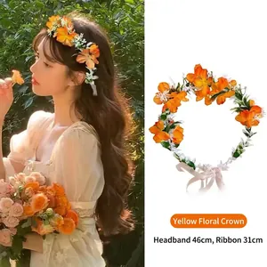 Detail of floral crown featuring orange silk flowers and ribbon ties for bridal photos