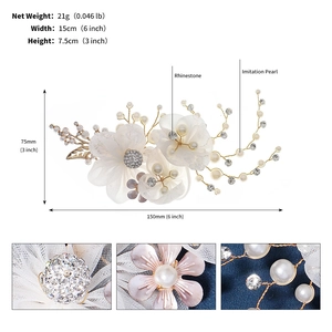 Detail view of handmade bridal hair clip with dimensions 15cm width and pearl accents