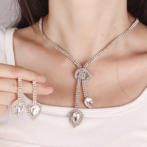 Parure de Bijoux de Mariée en Alliage et Strass de Luxe Collier et Boucles d'Oreilles Pendentif Goutte d'Eau pour Mariage Banquet Fête Femme