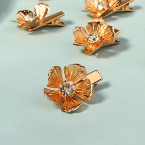 Exquisite gold metal flower hair clips with sparkling center zircons for women