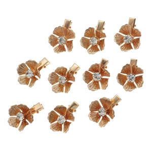 Set of 10 gold metal flower hair clips with sparkling crystal centers and petal textures