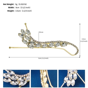 Close-up detail of luxury gold rhinestone leaf hair clip showing 9cm width and 9g weight