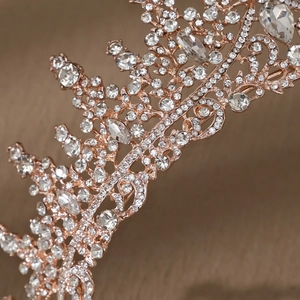 Detailed macro view of luxurious rose gold bridal crown with crystal rhinestones