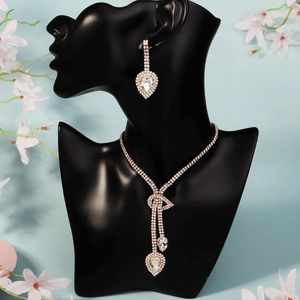 Parure de bijoux de mariée dorée avec collier à nœud et boucles d'oreilles gouttes